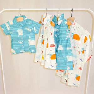 Children's Cosmo shirt in Surf's Up (teal)