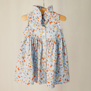 Children's sleeveless shirt dress with collar in "under the sea" print. 