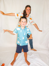 Load image into Gallery viewer, Children&#39;s Cosmo shirt in Surf&#39;s Up (teal)