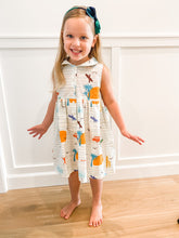 Load image into Gallery viewer, The sleeveless style lets your child play with ease and we even added pockets so your littles can stow away their treasures.